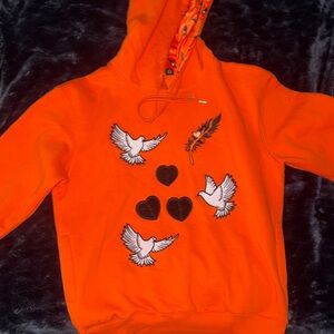 Orange Hoodie with Dove and Heart Design